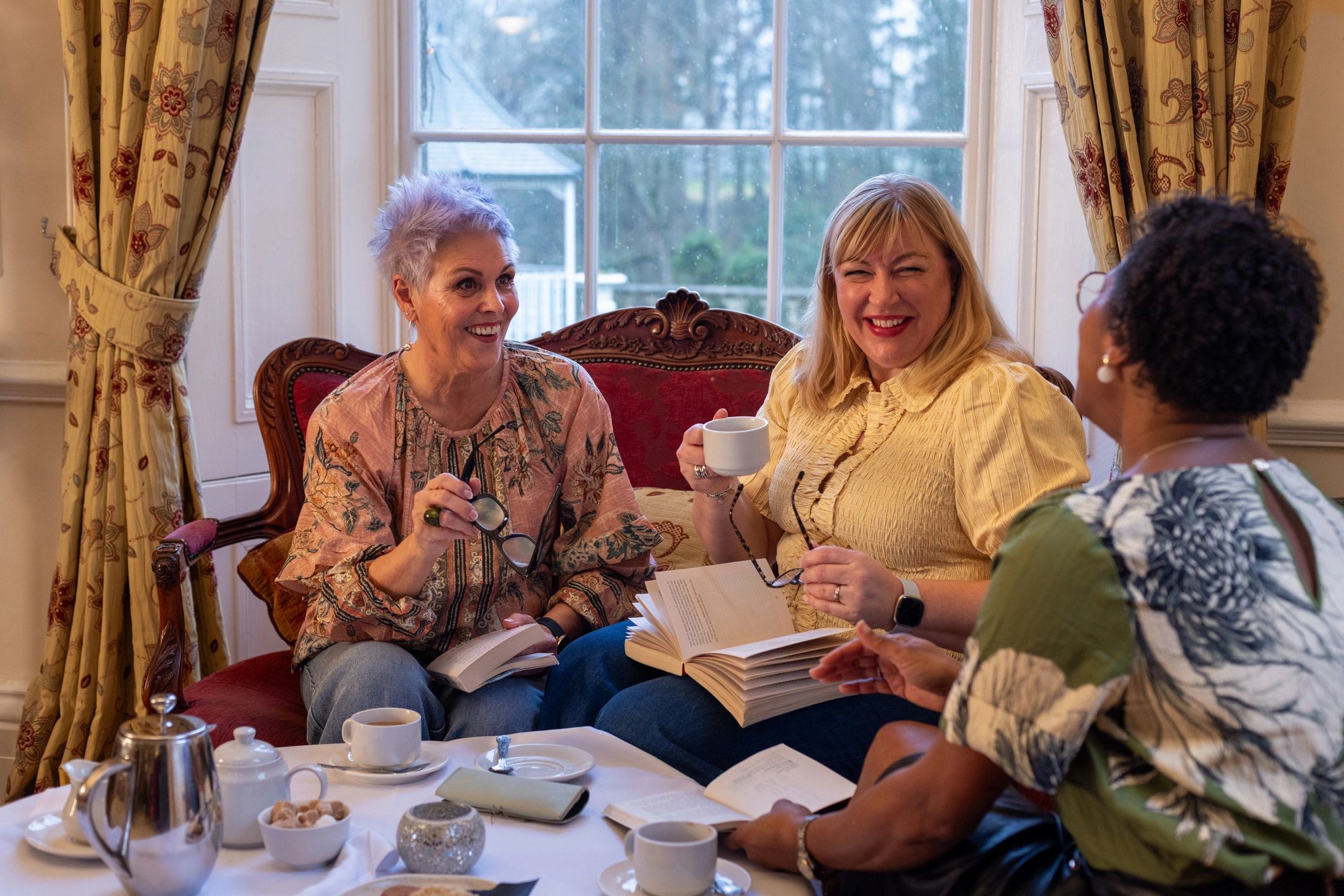 Members enjoying a refined lifestyle gathering in an elegant setting