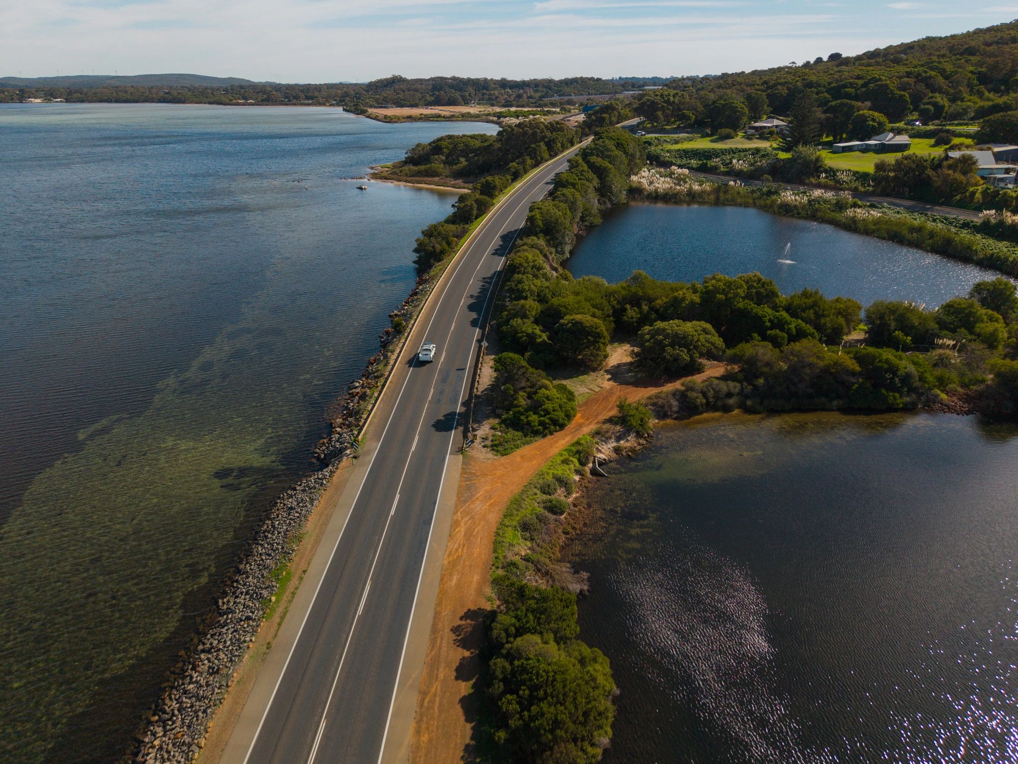 Coastal road drive with premium travel feel